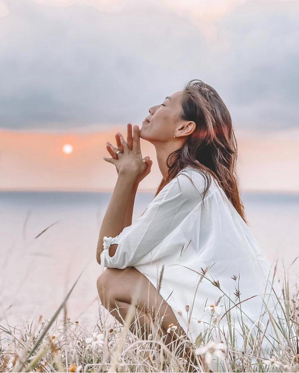 girl and sunset by the ocean