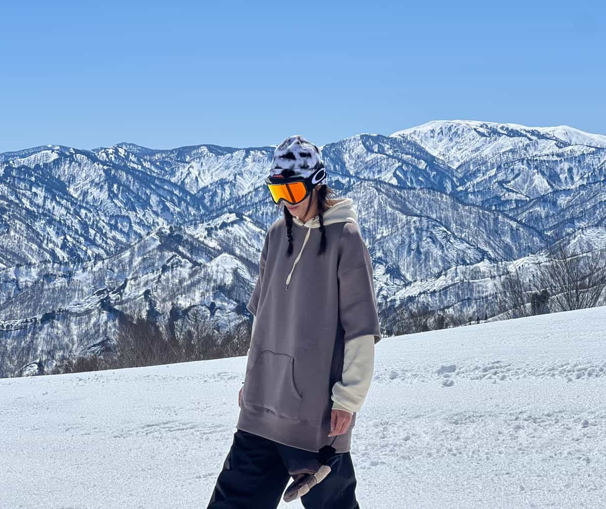 woman standing in Okutadami Maruyama Ski Resort, Niigata, Japan.